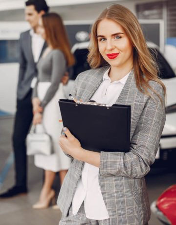 two-stylish-woman-car-salon